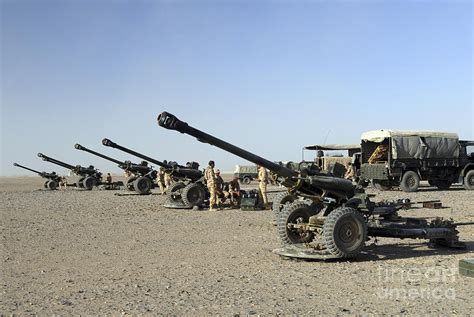 Howitzer 105mm Light Guns Are Lined Photograph By Andrew Chittock