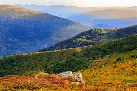 Autumn Color Illusion In Mountain Landscape By Sunlight Stock Image