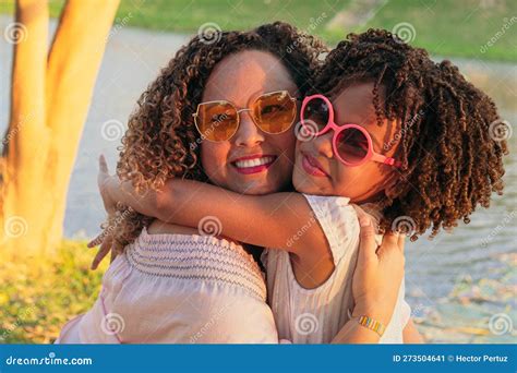 Portrait Of A Mother And Her Daughter In The Park During Summer Vacations Stock Image Image Of
