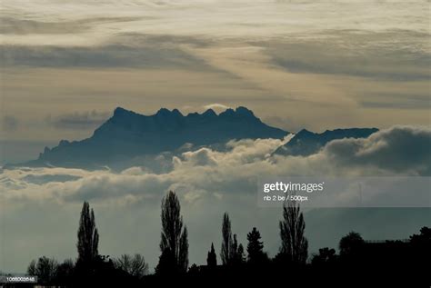 Mountain Peak Above Clouds High Res Stock Photo Getty Images