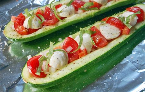 Stuffed zucchini boats are hollowed into cute, little boats and filled with sausage and cheese. Baked Stuffed Zucchini Boats - The Apron Archives