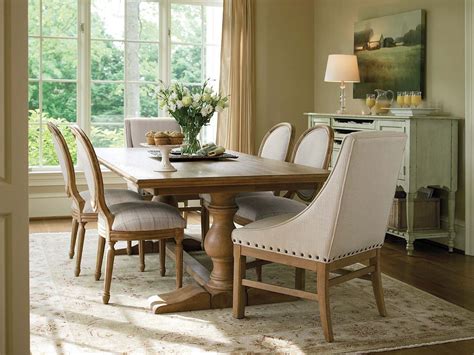 1.white wooden dining room with a round table white wooden round table. 15 Ways to Bring Rustic Warmth to the Modern Dining Room