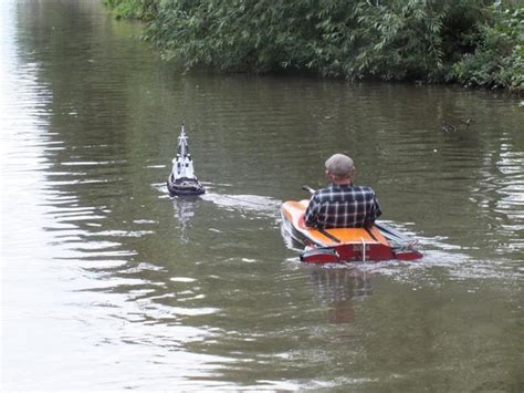 Guy Crosses Paths With Eccentric Older Man Using A Mini Tug Boat To