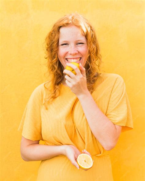 Free Photo Smiley Girl Licking Lemon