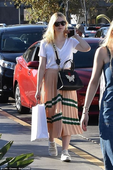 Dakota Fanning Holds Hands With Henry Frye In Los Angeles Daily Mail