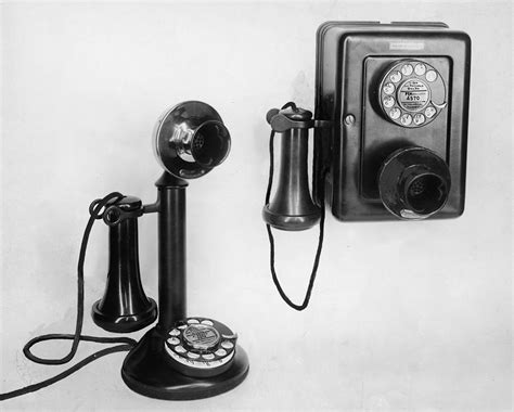 Two Old Fashioned Telephones Photograph By Authenticated News Fine