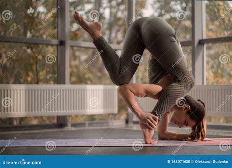 Athletic Woman Practices Yoga Unusual Pose Inspiration Complex