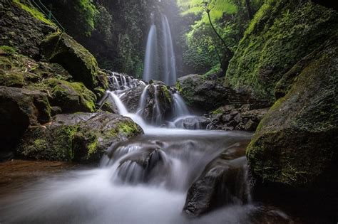 Premium Photo Beautiful Misty Waterfall On The Forest