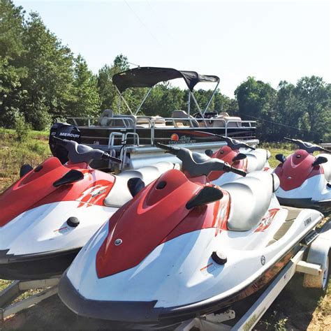 jetskis and a pontoon boat pontoon and jet ski rental