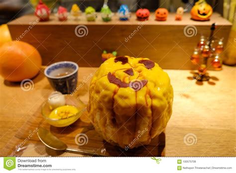 Kakigori With Pumpkin Flavour Topping And Decorated As Halloween