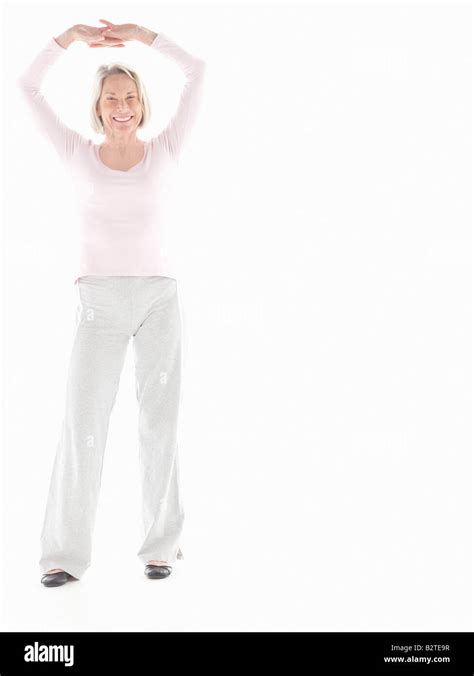 Mature Woman Stretching Stock Photo Alamy