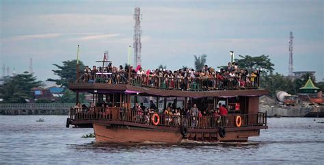 Enjoy The Beauty Of Kapuas River On A Tourist Boat Authentic Indonesia