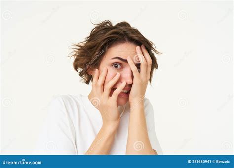 Close Up Of Brunette Woman Hiding Her Face Screams And Looks