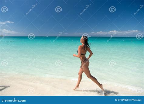 Woman In Bikini Running On Beach Stock Photo Image Of Water Pretty