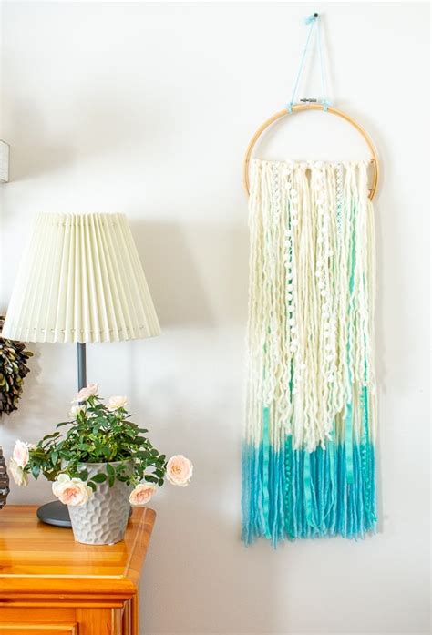 How To Make A Charming And Affordable Yarn Boho Wall Hanging The How