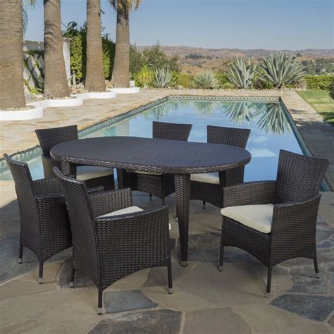 Outdoor 7 Piece Oval Wicker Patio Dining Set With Cushions