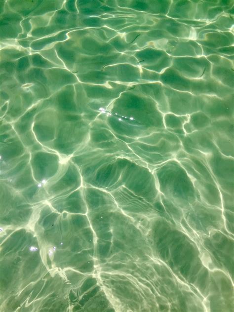 The Water Is So Clear That You Can See Its Ripples And Patterns