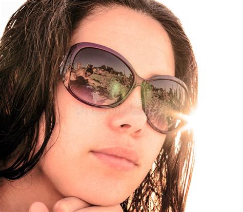 Face Of Young Brunette Girl In Sunglasses With Beach Reflection Stock