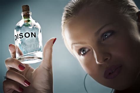 Woman Holding Poison Bottle
