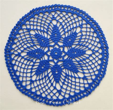 Blue Crocheted Doily On White Background