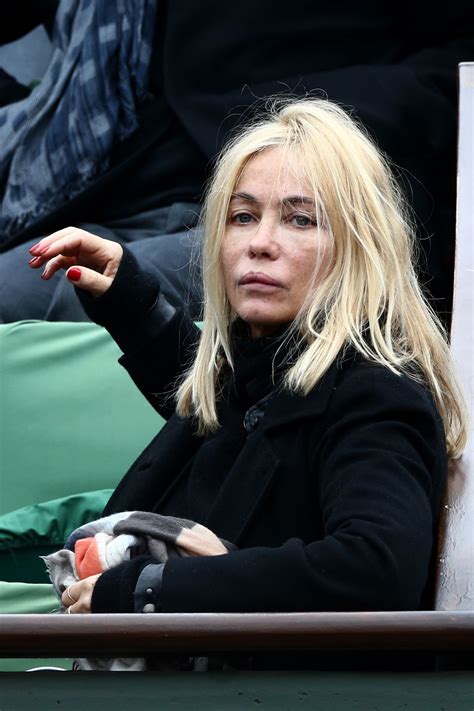 This movie made a perfect angel appearance! EMMANUELLE BEART at French Open at Roland-Garros Arena in ...