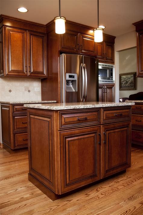 A guide for remodelers looking to expertly paint kitchen cabinets. Maple Cabinets | Maple kitchen cabinets, Stained kitchen ...