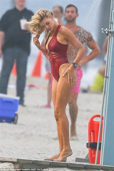 Kelly Rohrbach Puts Toned Shape On Show In Clinging Red Bathing Suit