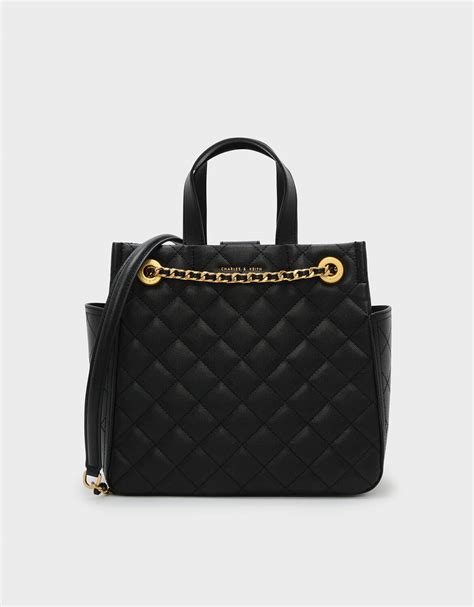 Find everything from crossbodies, purses, handbags, totes and travel options. CHARLES & KEITH Chain Detail Quilted Tote | Australian ...