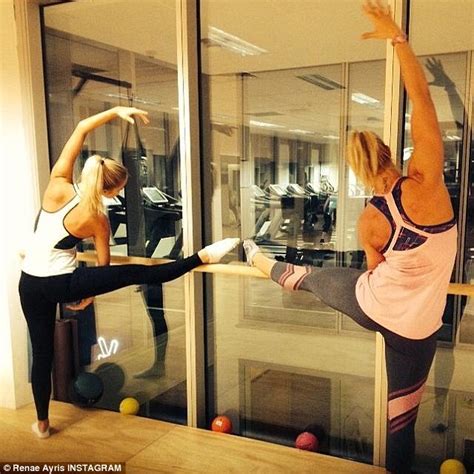 model renae ayris shows her flexiblility as she folds her body in half for fitness move daily