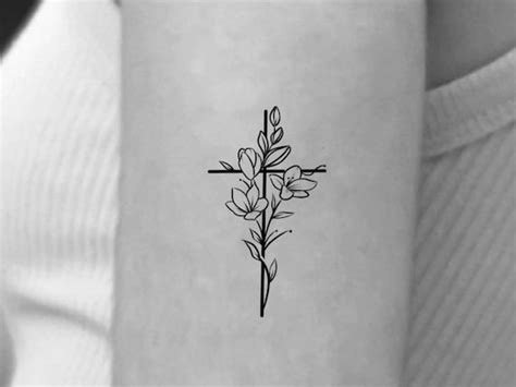 Cross Made Out Of Flowers Tattoo