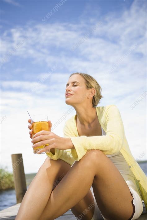 Woman Enjoying A Cold Drink Stock Image F0035937 Science Photo