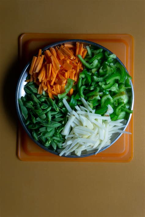 Fresh Cut Vegetables Stacked Together In A Plate Pixahive