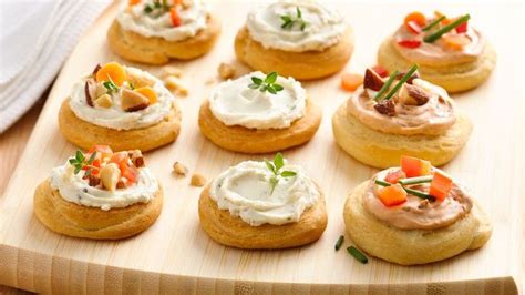 Easy christmas appetizers including cute christmas appetizers, make ahead options, and more! Creamy Herb Crescent Bites | Recipe in 2020 | Easy cold finger foods, Christmas appetizers easy ...