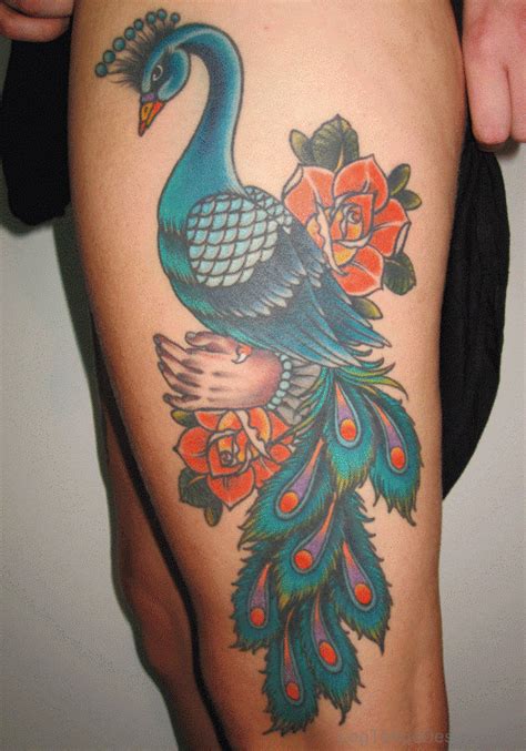 49 Stunning Peacock Tattoos On Thigh Leg Tattoo Designs