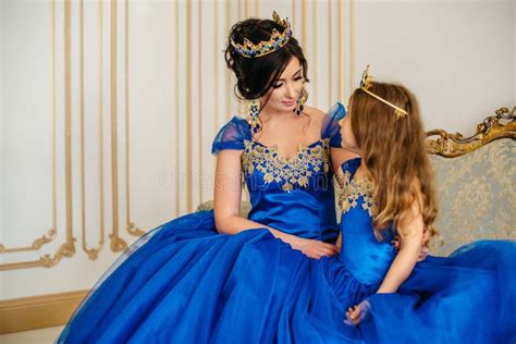 Beautiful Princess Mother And Daughter In A Gold Crown Stock Image