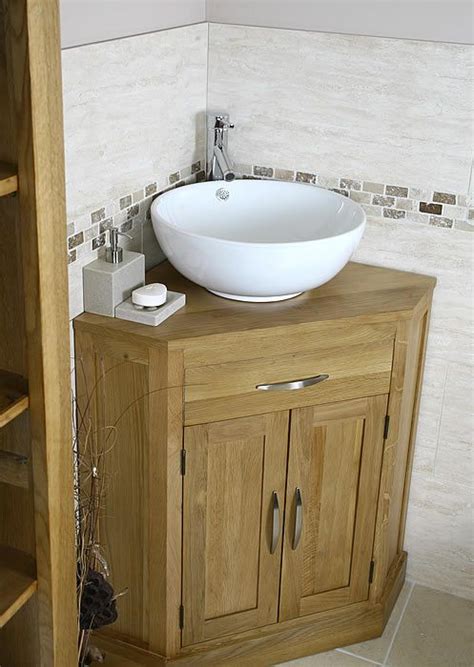 Or, you can also leave the space open for a clean, minimalist feel. Corner Bathroom Vanity Ideas … | Small bathroom sinks ...