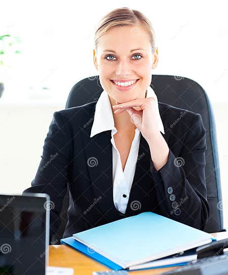Sophisticated Businesswoman Smiling At The Camera Stock Image Image