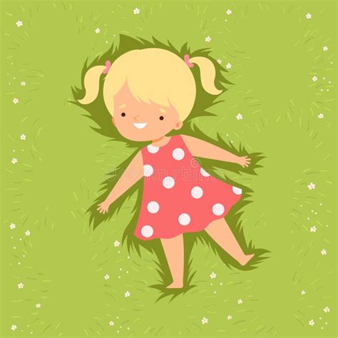Top View Of Adorable Smiling Girl Lying Down On Green Lawn Cute Kid