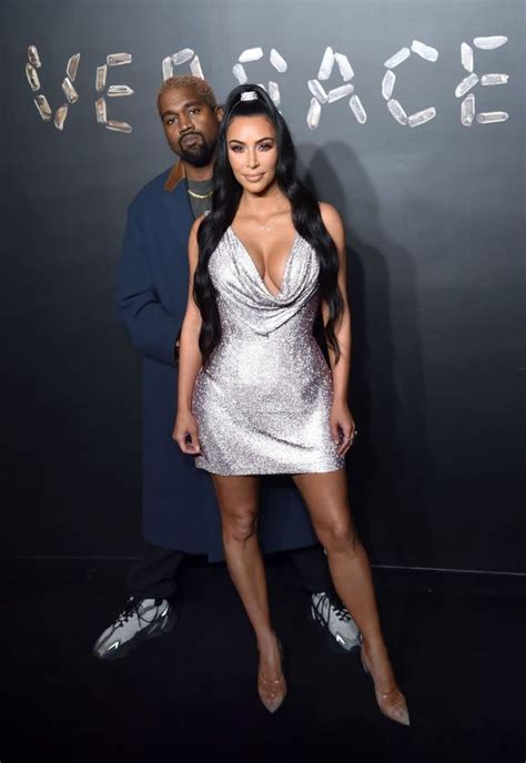 Kanye West Gets Goofy Posing Alongside Wife Kim Kardashian On The