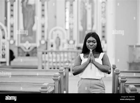 Woman Praying In Cathedral Black And White Stock Photos And Images Alamy