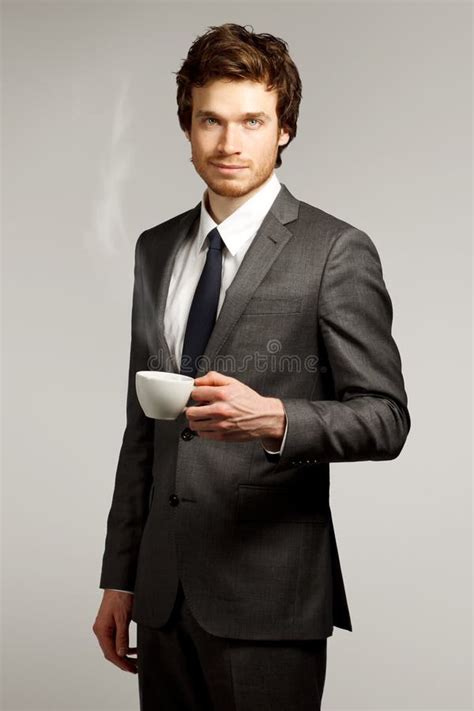 Young Business Man Holding A Cup Stock Image Image Of Design