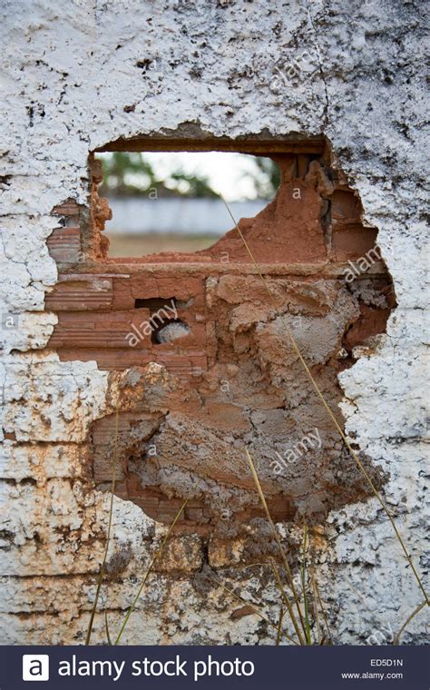 Hole In Crumbling Wall Stock Photo Alamy