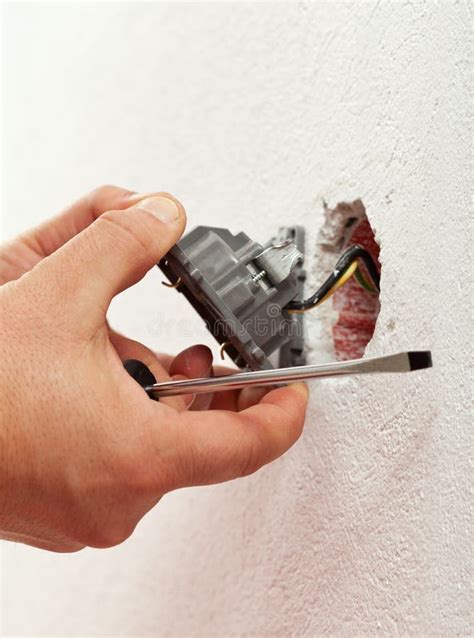 Electrician Mounting Electrical Wall Fixture Stock Photo Image Of