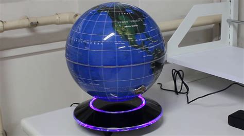 Electromagnetic Levitation Making A Globe Float Over A Magnetic Base