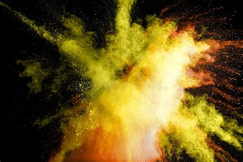 Abstract Yellow Powder Explosion On Black Backgroundfreeze Motion Of