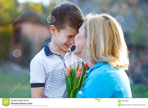 Happy Mother Get Tulips From Son At Mothers Day Stock Image Image Of