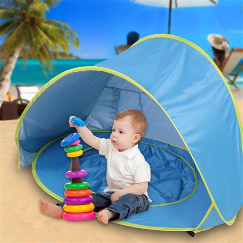 The baby beach shade is made of waterproof, sun and uv protection 190t silver coated fabric, which will keep the inner tent dry. WALFRONT Portable Infant UV Protection Baby Beach Tent ...
