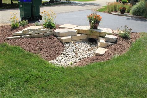 Stone Culvert With Natural Wisconsin Limstone And Mulch Border
