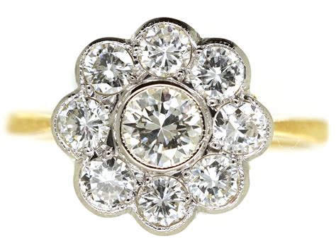 18ct gold and platinum diamond daisy cluster ring the antique jewellery company
