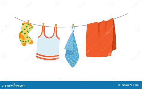 Drying Children`s Clothes And Accessories After Washing On A Rope
